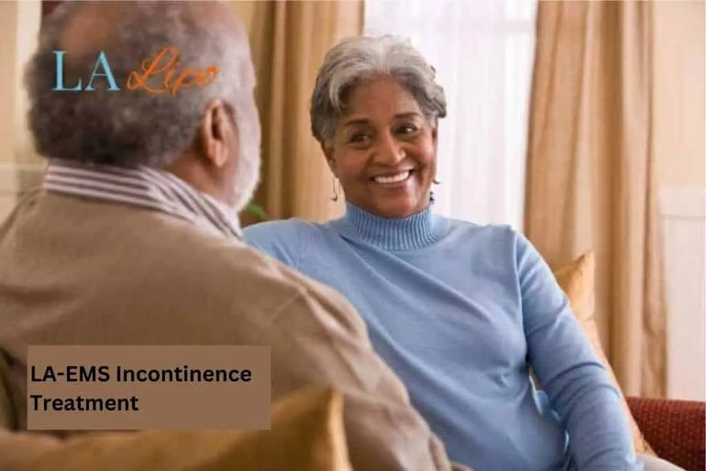 Couple sat smiling at each other - LA-EMS treatment Perivale