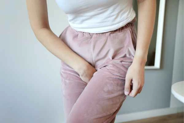 woman struggling with urine incontinence Perivale